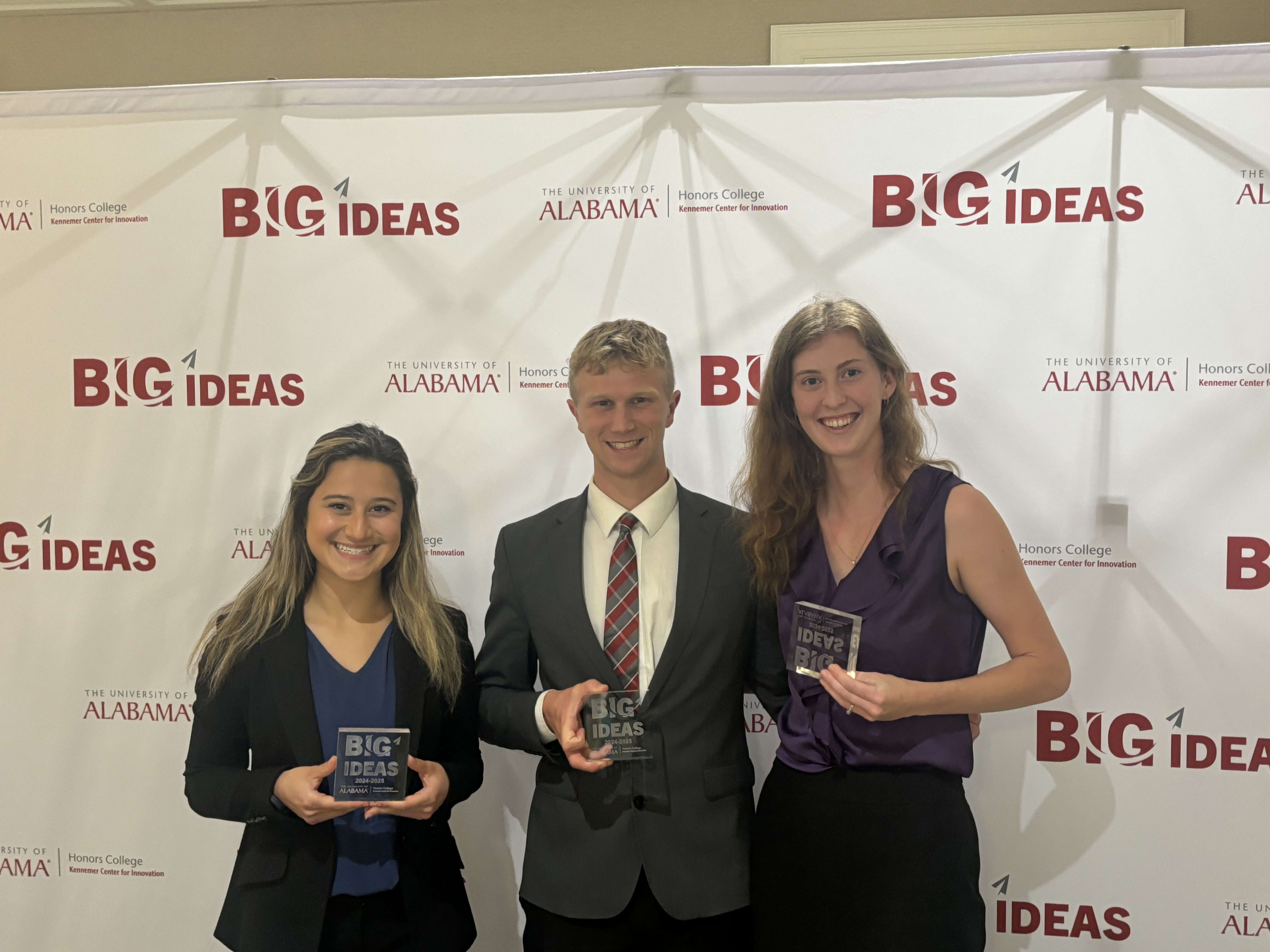 Thomas presenting to a crowd