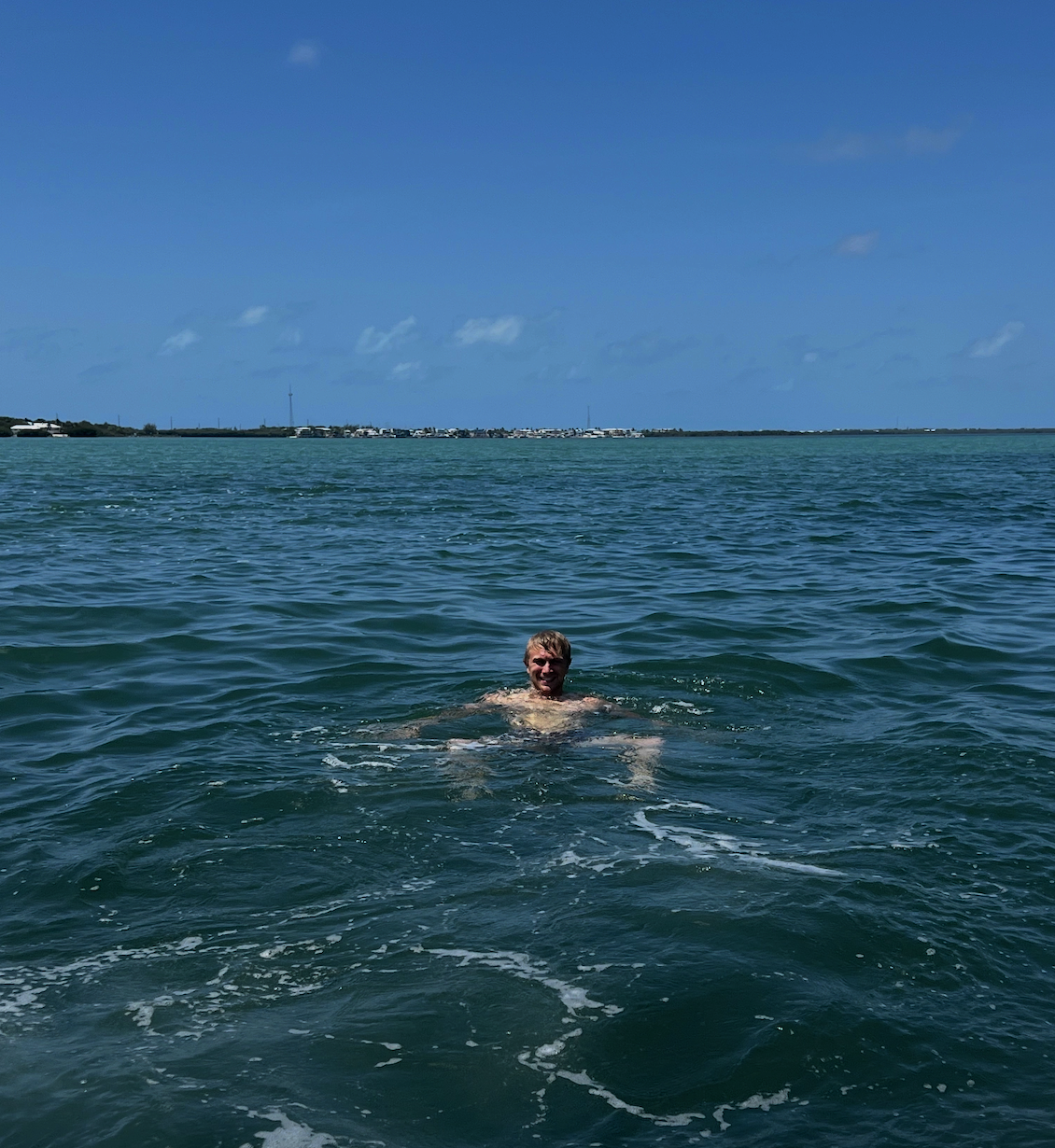 Thomas in the blue ocean